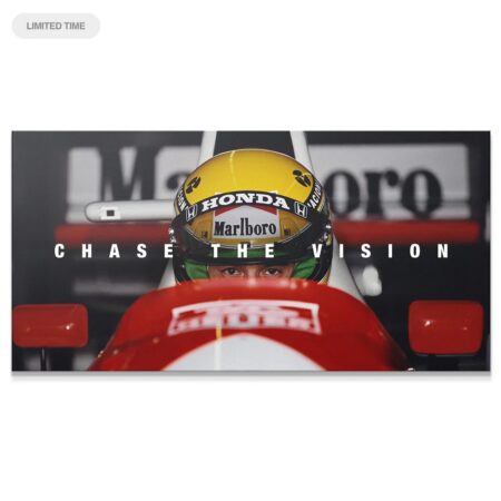 Close-up of Ayrton Senna's intense eyes from the 'Senna - Chase The Vision' F1 poster.