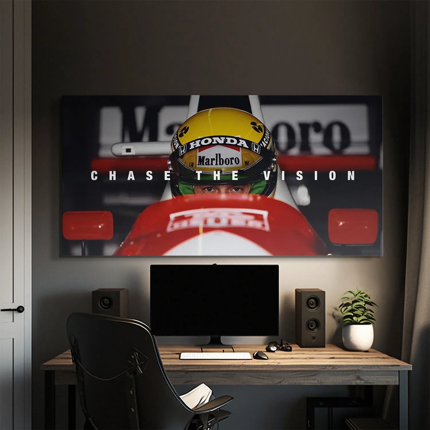 Low-angle perspective of the cockpit and red racing livery used in 'Senna - Chase The Vision' artwork.