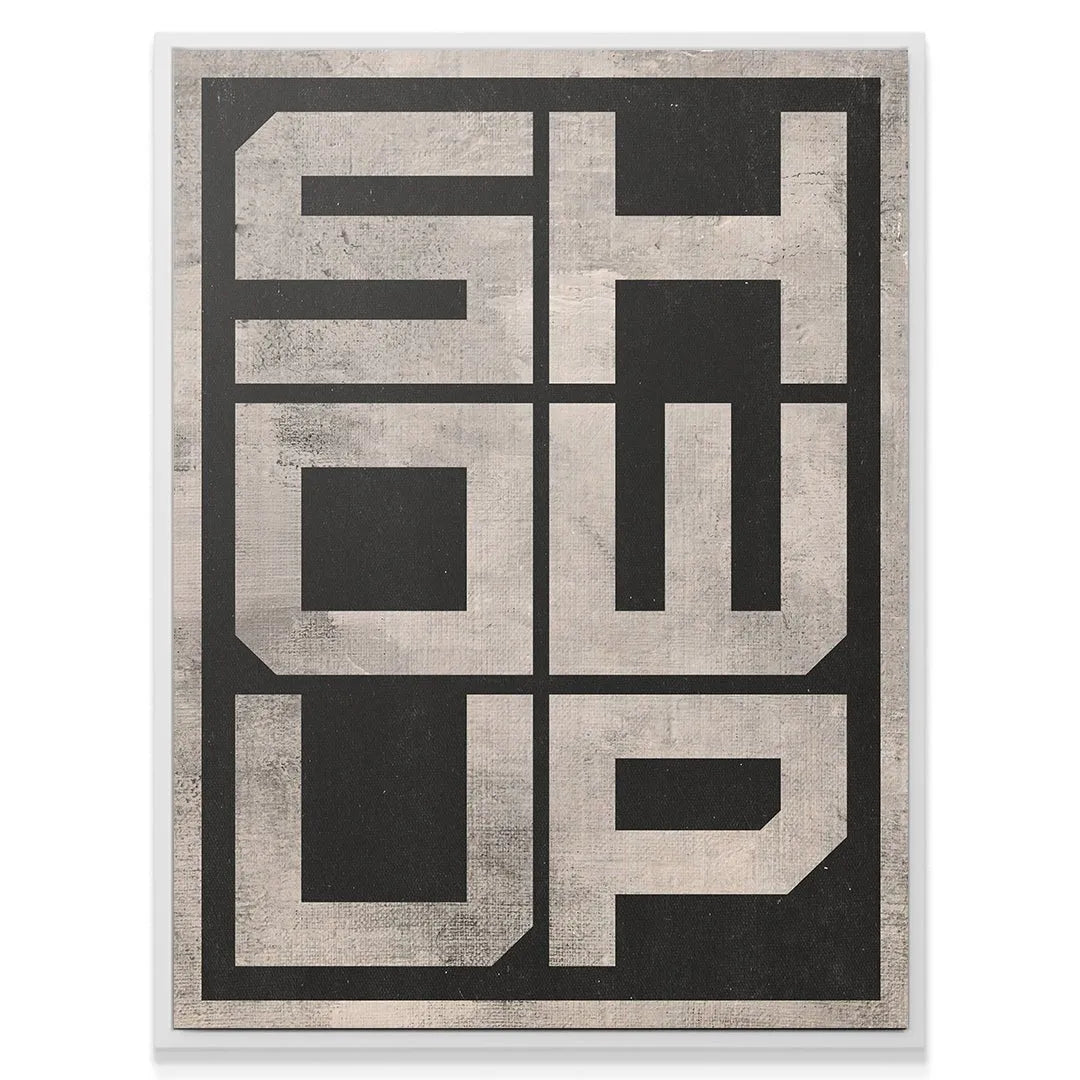 A corner detail emphasizing the geometric block lettering featured in the 'Show Up - 2' design.