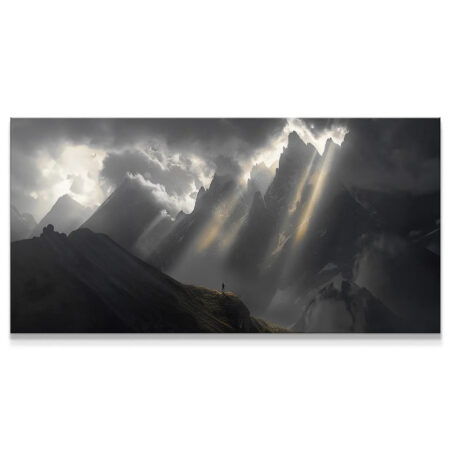 Wide shot showing the full panorama of the dark, towering mountains with the hopeful light beams in "Silver Lining (No Quote)".