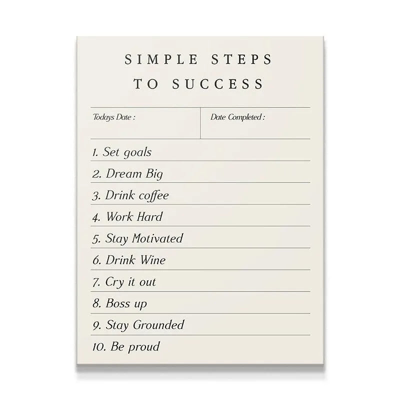 Overhead studio shot of the creamy white "Simple Steps To Success" motivational checklist notepad.