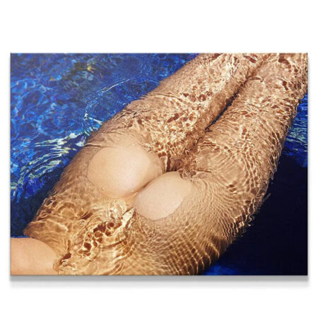 Skinny Dip close-up showing water ripples reflecting golden light on submerged skin.