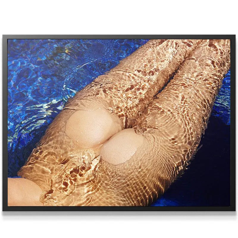 Abstract angle of the Skinny Dip print focusing on the distortion of legs beneath blue pool water.