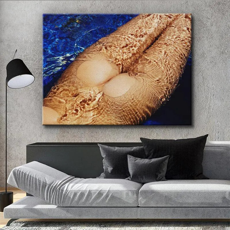 Lifestyle image of the sensual Skinny Dip print hanging in a modern, minimalist bedroom setting.