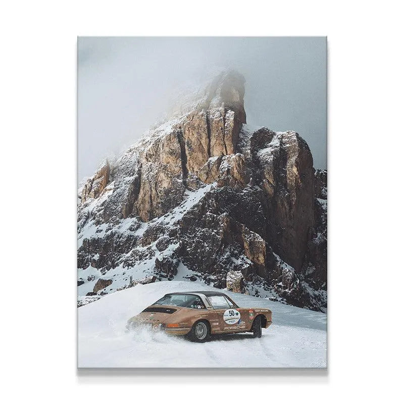 Classic Porsche rally car kicking up snow spray on a challenging mountain 'Snow Day'.