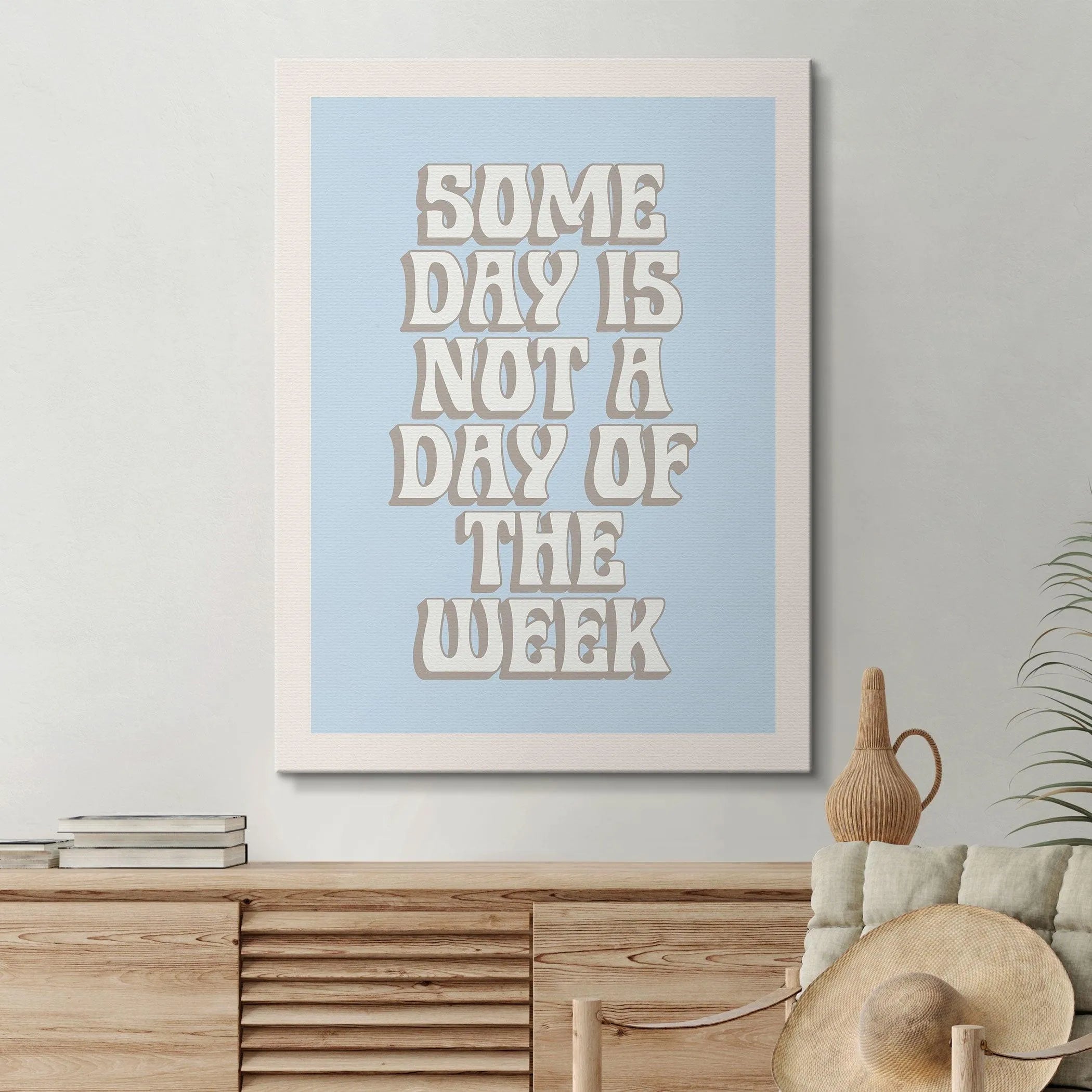 Corner angle shot capturing the crisp white border surrounding the Some Day quote art print