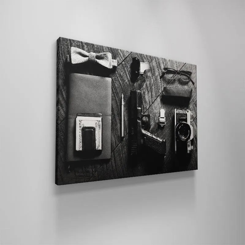 Monochromatic composition emphasizing the dramatic lighting and shadows of the complete Spy Essentials setup.