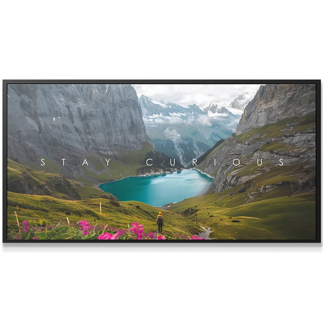 Close-up texture of the mountain canvas print highlighting the word 'Stay Curious' and rocky cliffs.