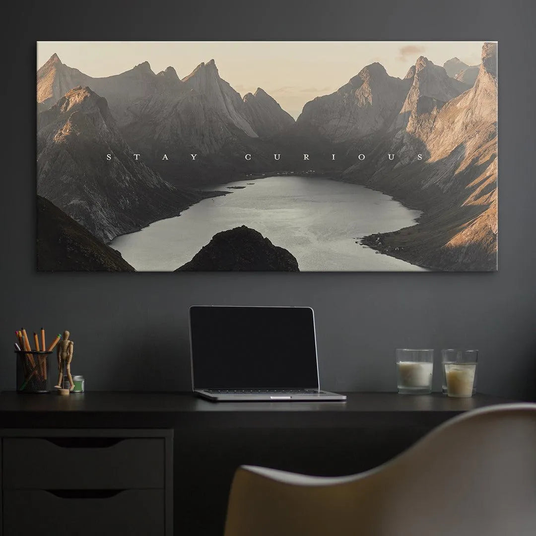 Lifestyle shot: print mounted above a minimalist sofa, highlighting the scale of Stay Curious (shortstache™︎).