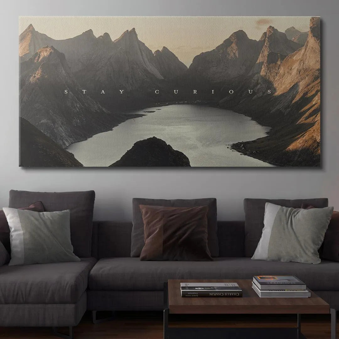 Angled perspective of the deep water reflecting the majestic mountains in the Stay Curious (shortstache™︎) print.