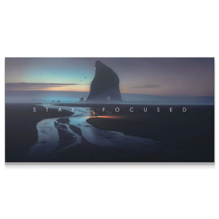 Wide-angle view of the dramatic coastal landscape art print that reads "Stay Focused."