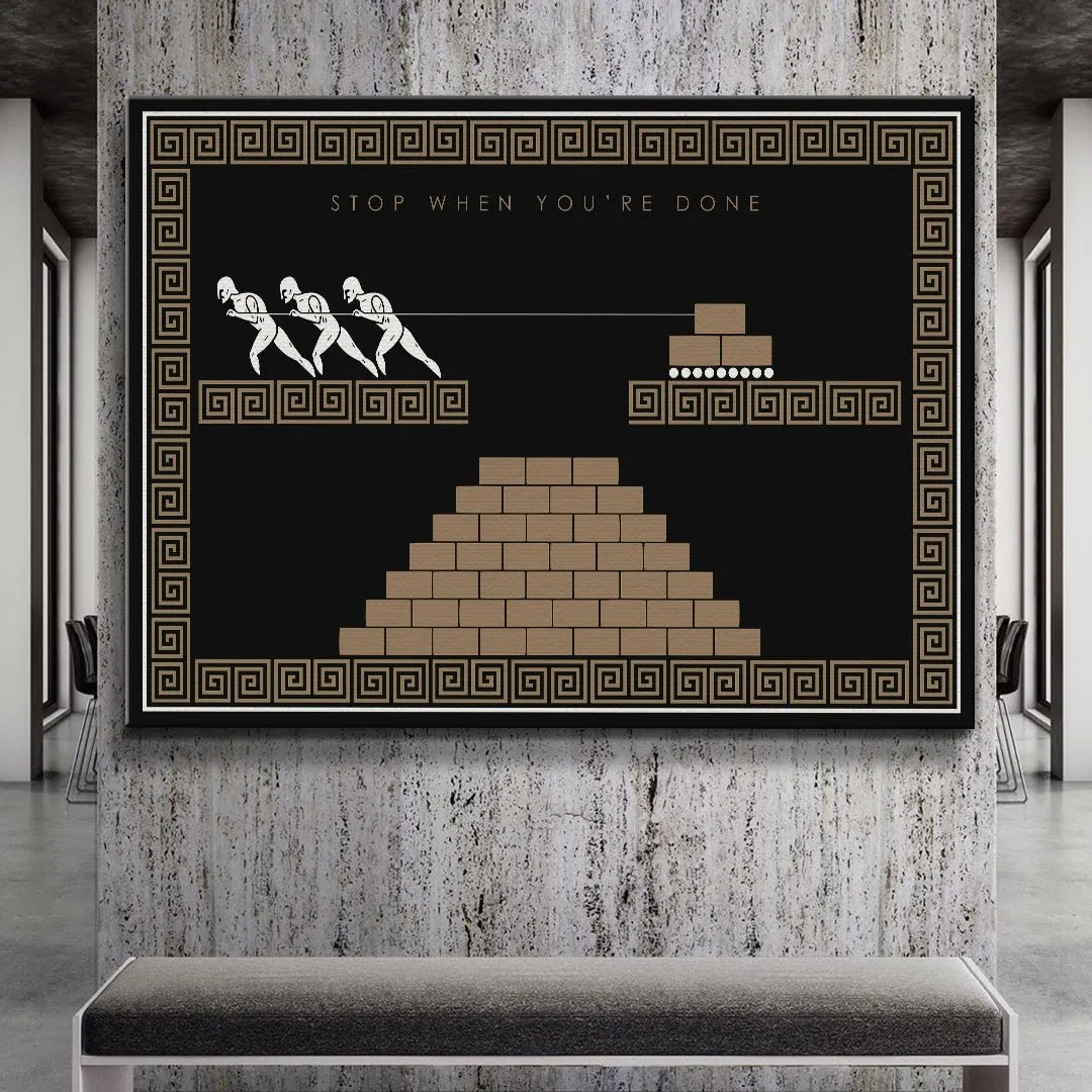 Lifestyle mock-up of the Stop When You're Done - Empire Series framed poster hanging in a modern office environment.