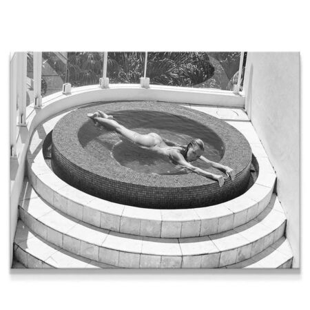 Full scene of the nude figure performing a deep horizontal Stretch in the luxury tiled spa.