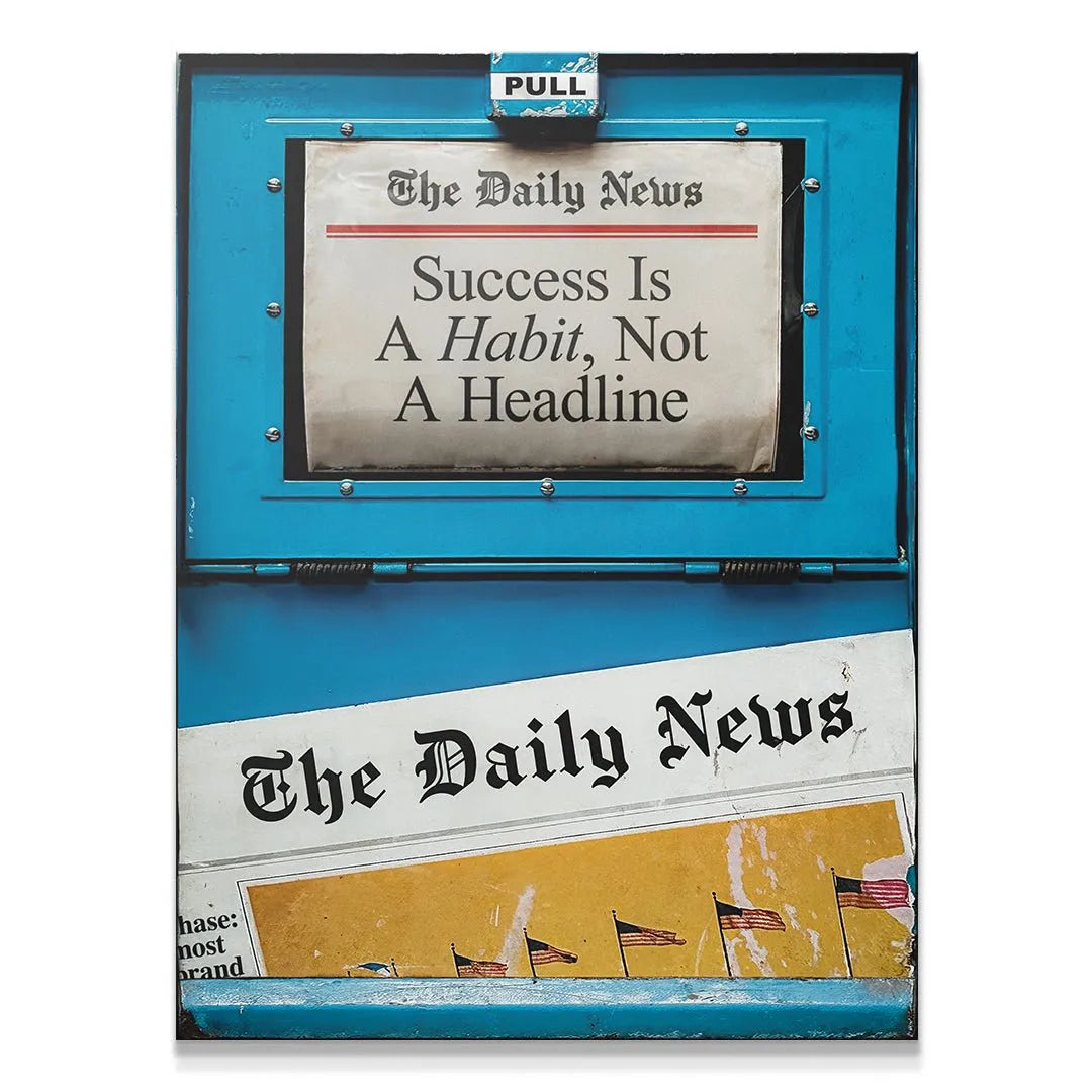 Vintage blue newspaper vending machine art print featuring the full motivational text, 'Success Is A Habit, Not A Headline'.