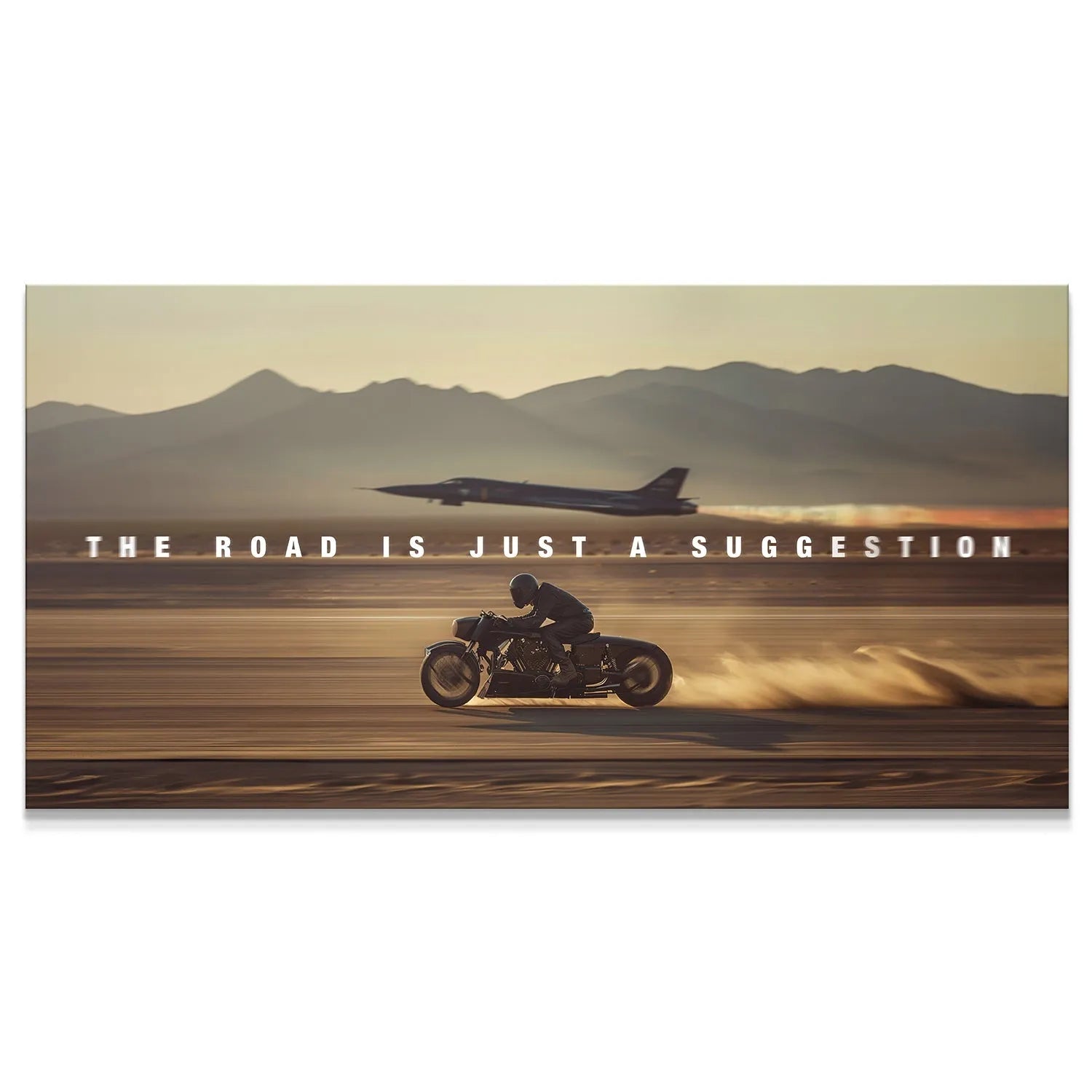 Motorcycle speeding across the desert floor with the quote "The Road Is Just a Suggestion" prominently displayed.