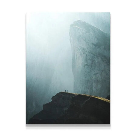 Full vertical view of the misty mountain cliffs with two figures on the ridge, known as the Summit print.