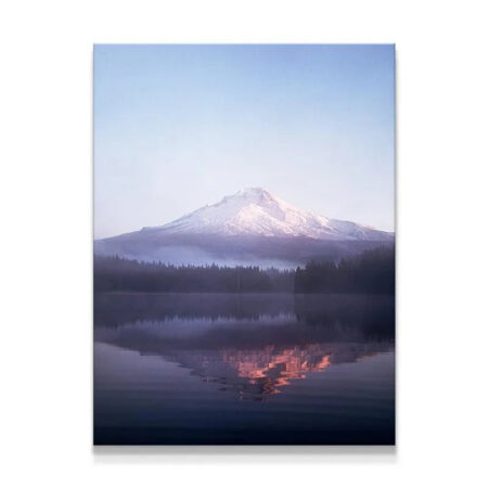 Wide view of the pristine water reflection captured during the Sunrise at Mt.Hood over a still mountain lake.