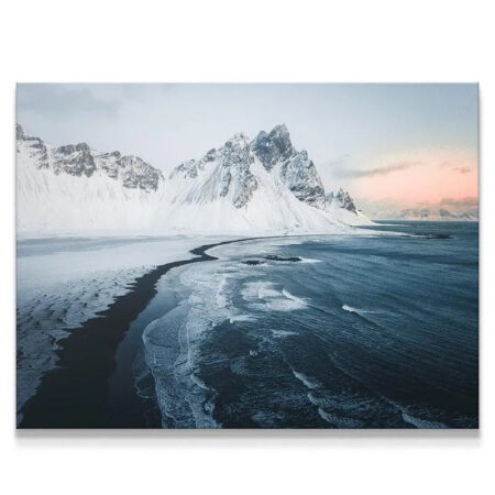 Wide panoramic view of Vestrahorn mountain during the stunning Sunrise at stokksnes.