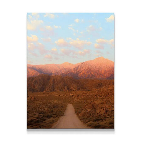 Full vertical shot of the dirt road leading toward the peaks at 'Sunrise In the Sierras'.