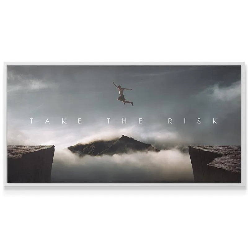 Lifestyle image showing the large canvas size of 'Take The Risk (Jump)' mounted above a modern desk.