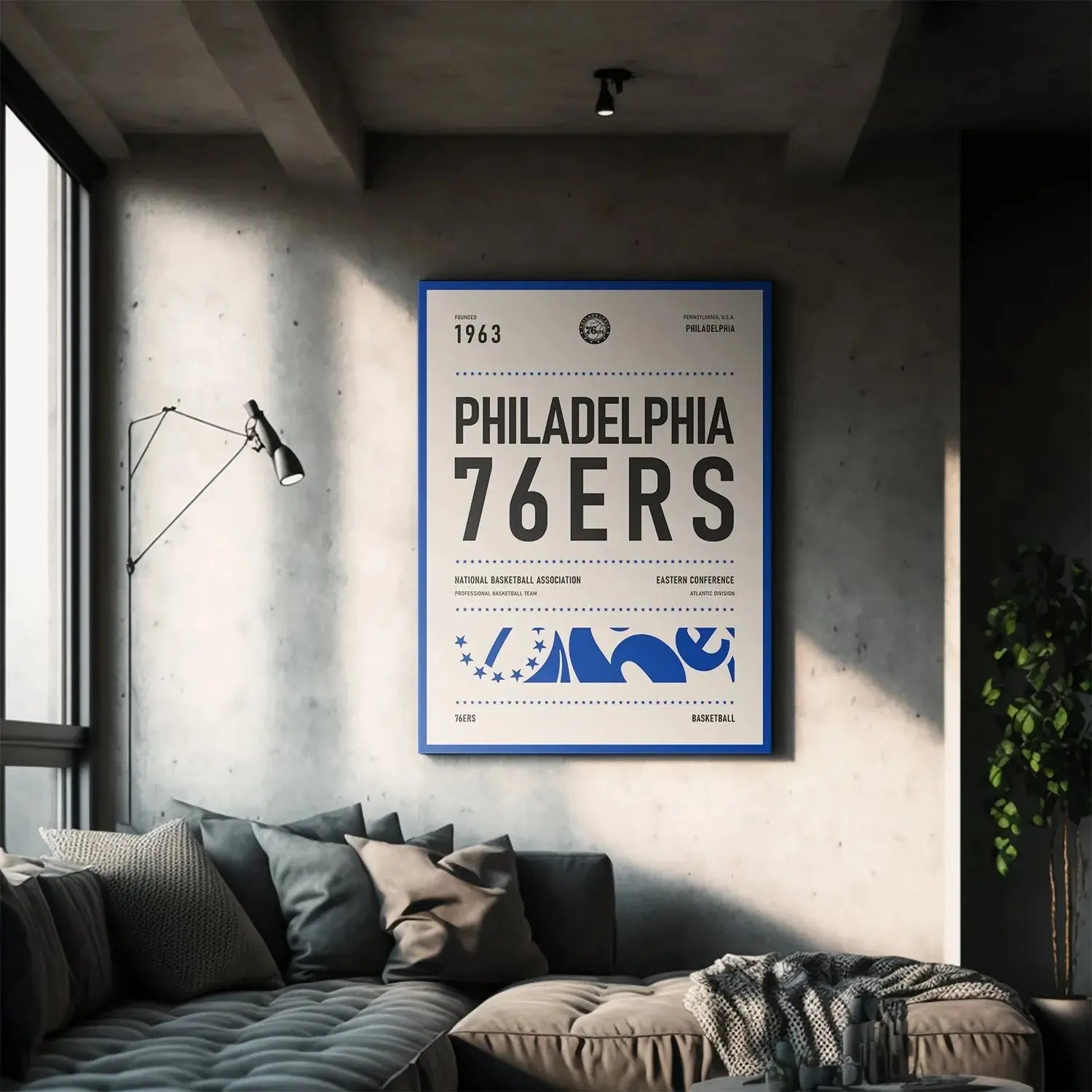 Lifestyle mock-up of the framed Team Poster - 76ers hanging above a modern desk in an office setting.