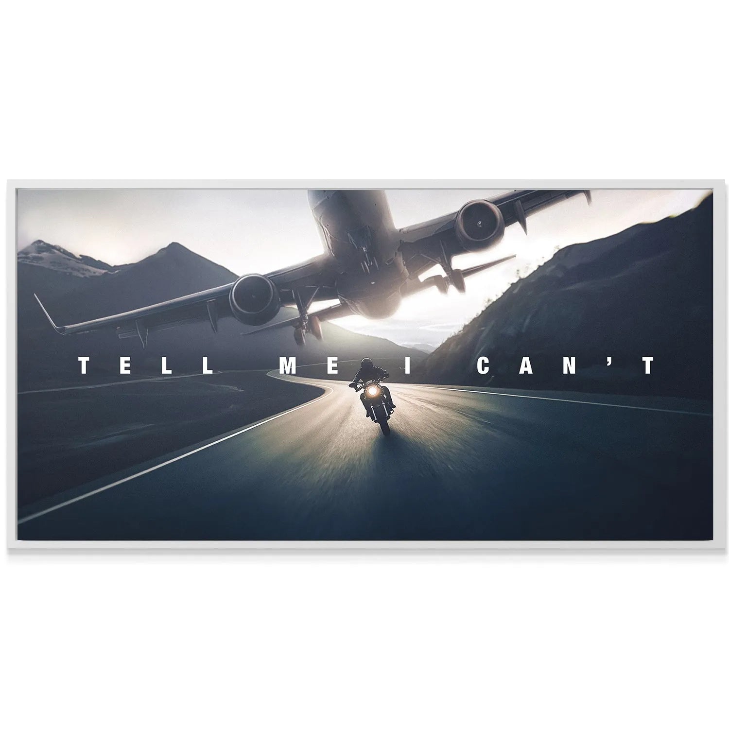 Lifestyle view showing the framed "Tell Me I Can't" art hanging dramatically in a modern office space.