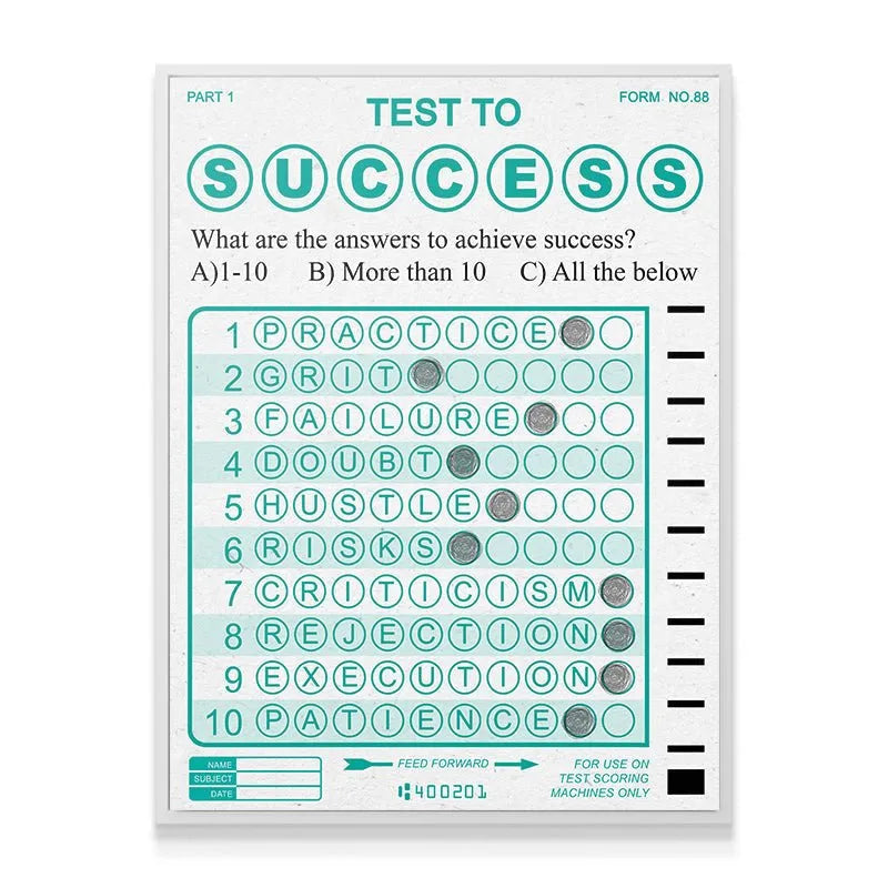 Angle shot highlighting the filled-in bubbles for 'Failure' and 'Grit' on the 'Test To Success' success form.