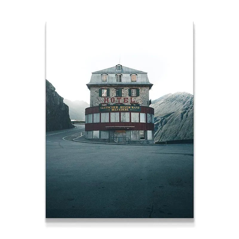 Wide shot of The Belvedere hotel exterior nestled between rugged mountains.
