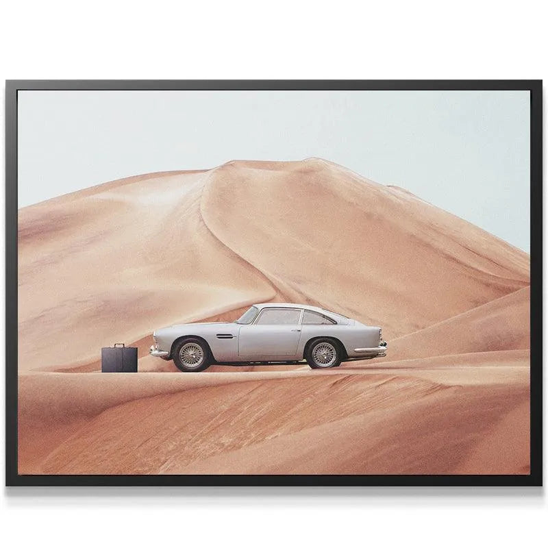 Close-up detail of the vintage car's wheel spokes and chrome bumper featured in 'The Drop' artwork.