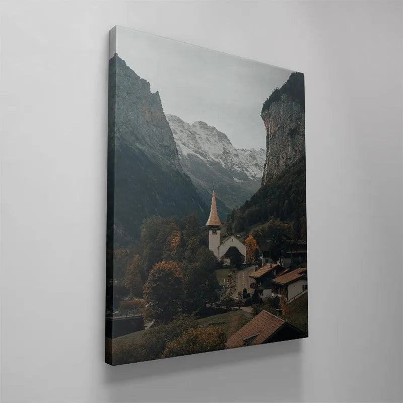 The dramatic shadow lines and rich evergreen forest hues captured in 'The Fall Valley' photographic print.