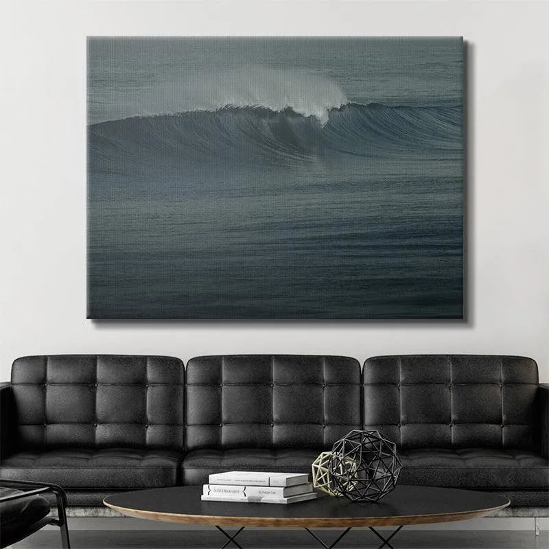 Lifestyle image of "The Glass Curl" artwork hanging above a minimalist gray sofa in a living room.