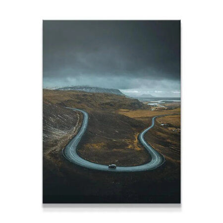 High-angle view of the winding highway print titled 'The Road Less Traveled'.