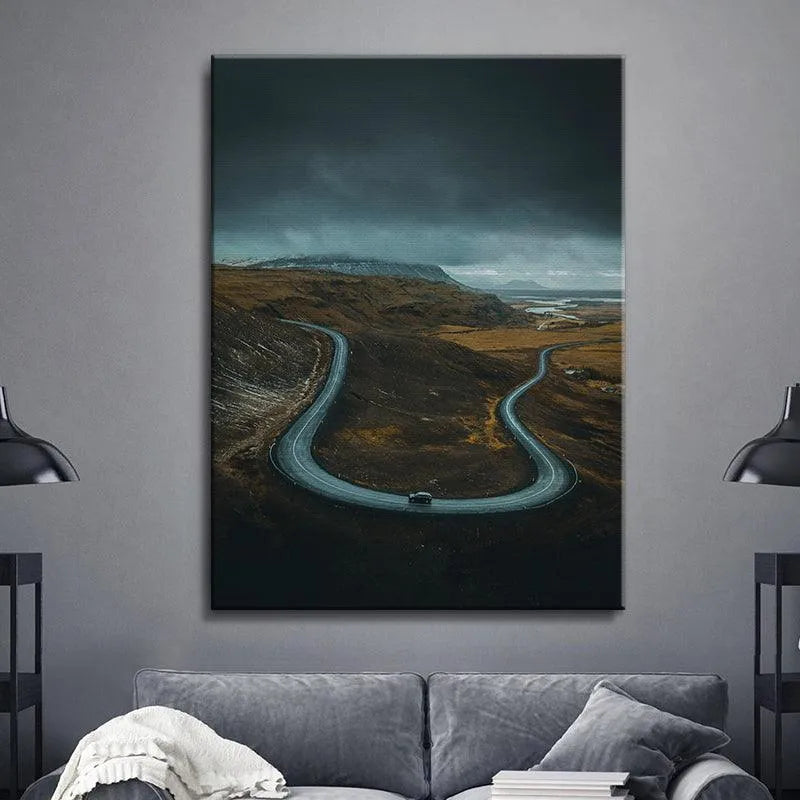 Full vertical shot of the moody landscape print 'The Road Less Traveled' under a dark sky.
