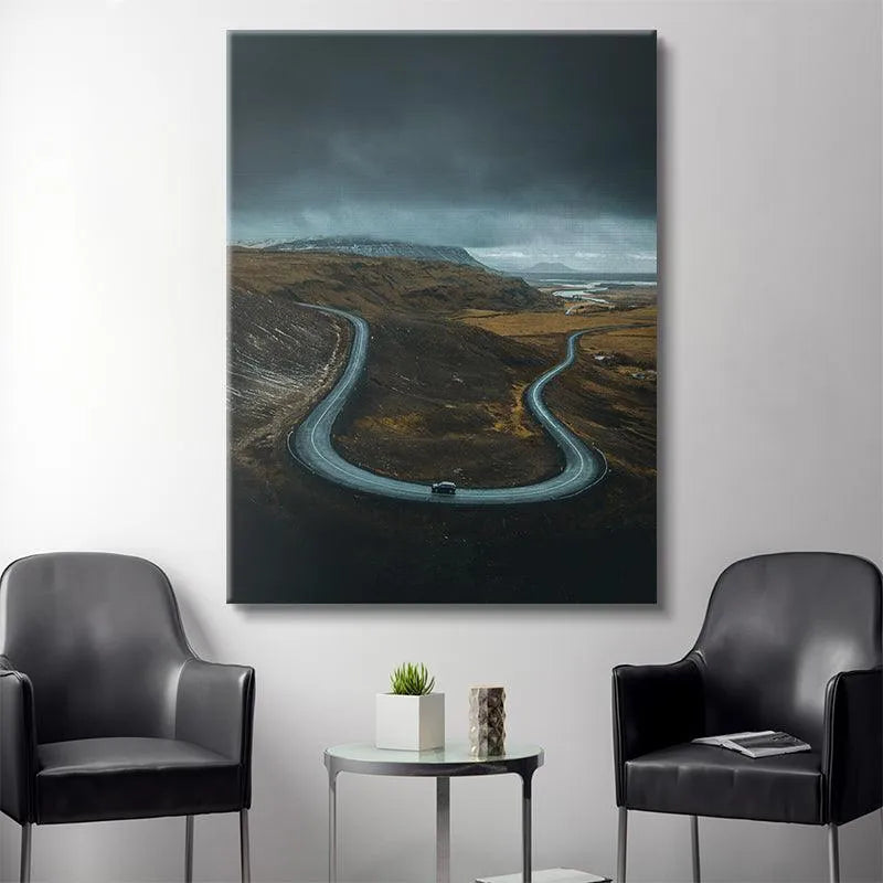 Detailed crop focusing on the solitary car traveling along 'The Road Less Traveled' curve.