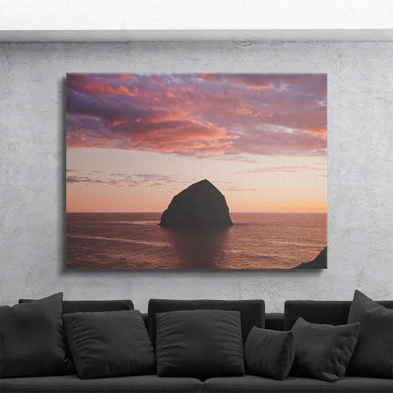 Detailed view of the vibrant pink and orange reflections on the water surface near The Rock formation.