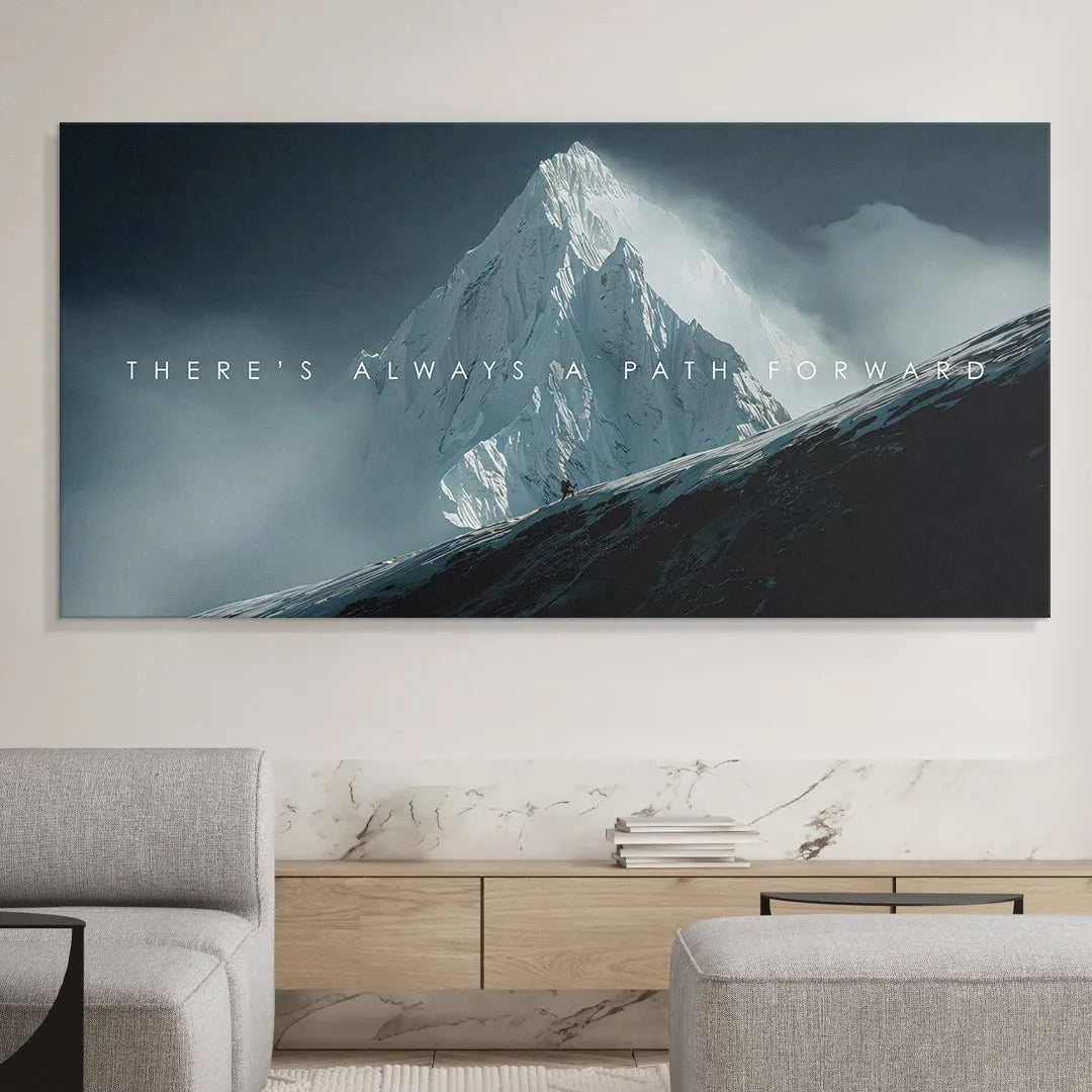 The typographic overlay centered on the dark mountain face emphasizing the quote: There's Always A Path Forward.