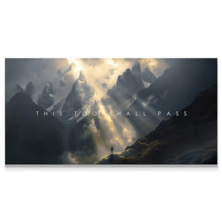 Wide shot of mountain peaks at dawn, featuring the quote 'This Too Shall Pass' in white text.