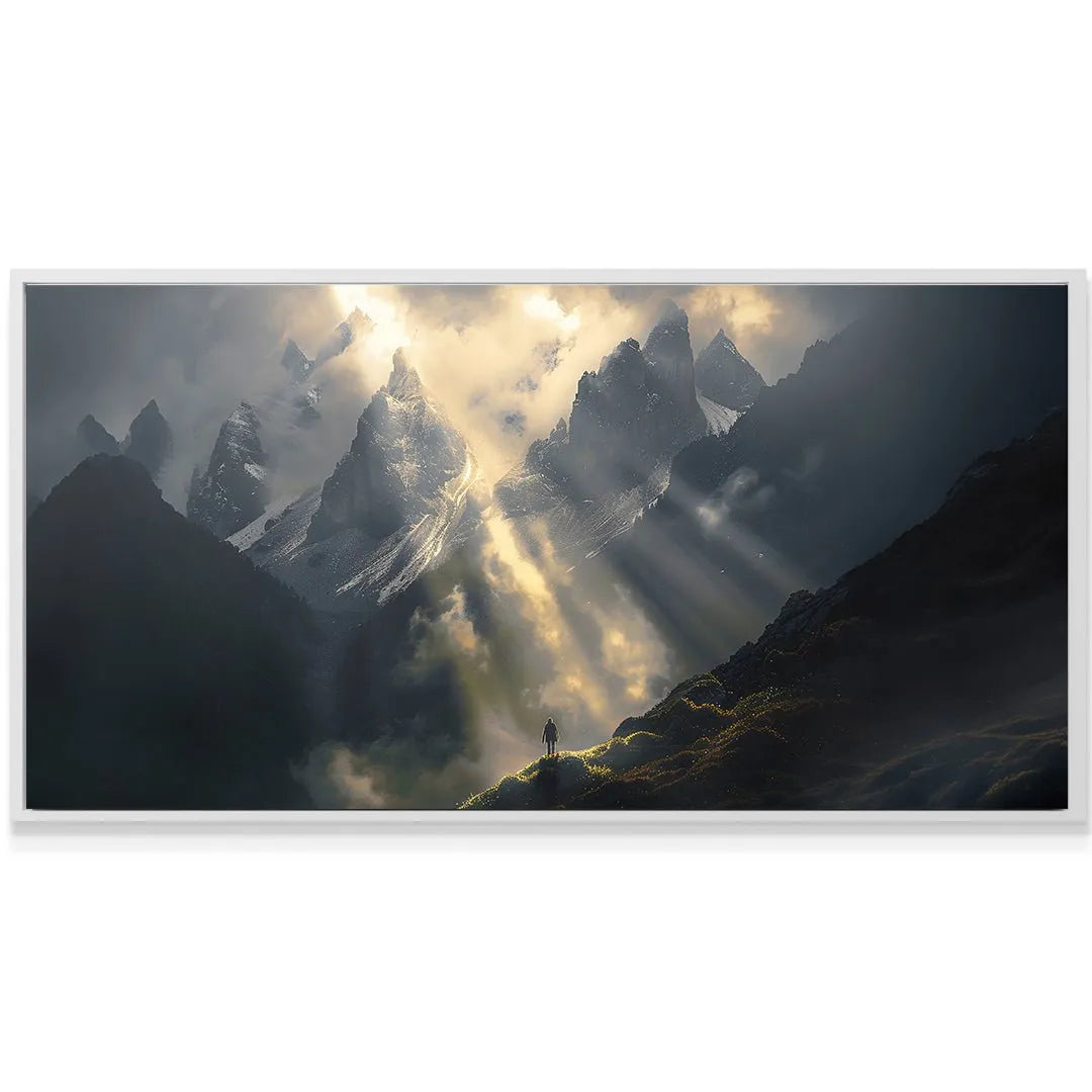 Dramatic angle of sun rays breaking through mountain clouds above the philosophical phrase 'This Too Shall Pass'.