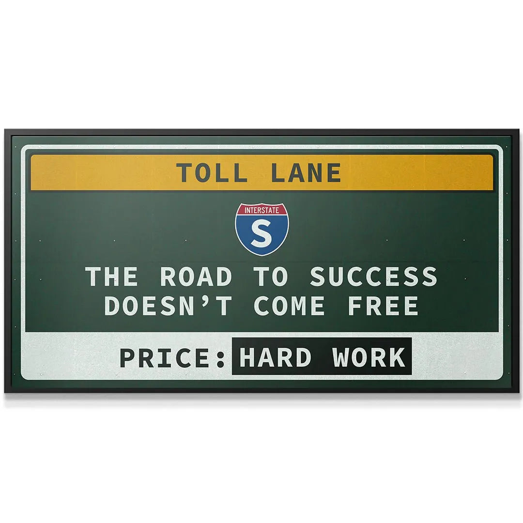 Close-up detailed texture of the green enamel finish on the Interstate Toll Lane sign.