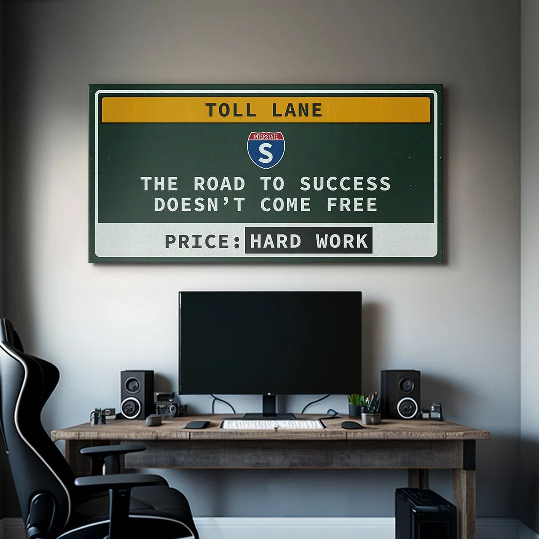 Angled perspective showing the reflective quality of the white lettering on the Toll Lane decor.
