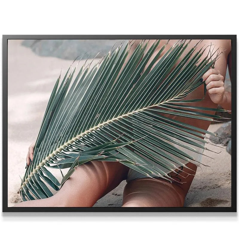 Lifestyle shot of bohemian decor featuring the intimate 'Topless Beach' print canvas.
