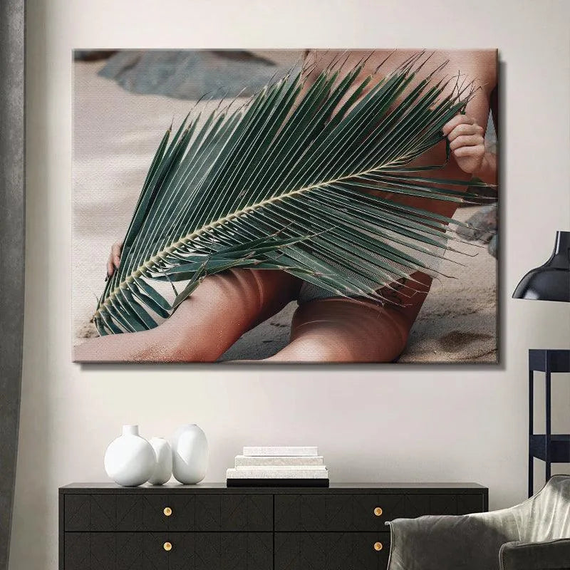 Detailed capture of the hand gripping the dense foliage in the Topless Beach scene.