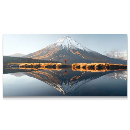 Wide panoramic view of the 'Tranquil Reflection' symmetrical mountain landscape.