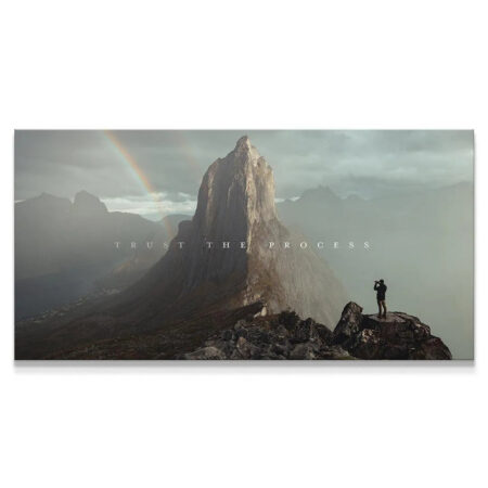 Wide-angle view of the dramatic mountain landscape canvas featuring the inspiring text 'Trust The Process'.