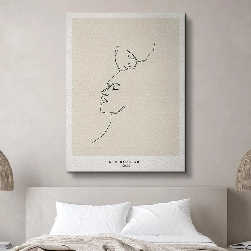 High-angle view of the framed 'Two Hearts - White' artwork hanging in a bedroom setting.