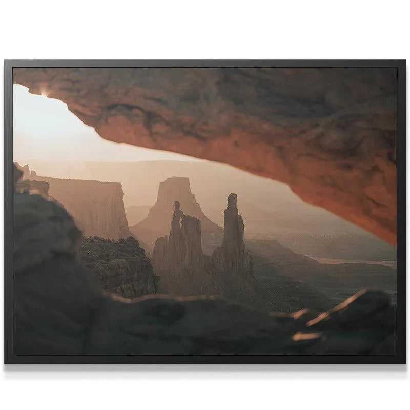 Close-up texture of the rough sandstone arch obscuring the sun, defining Under the Glow.