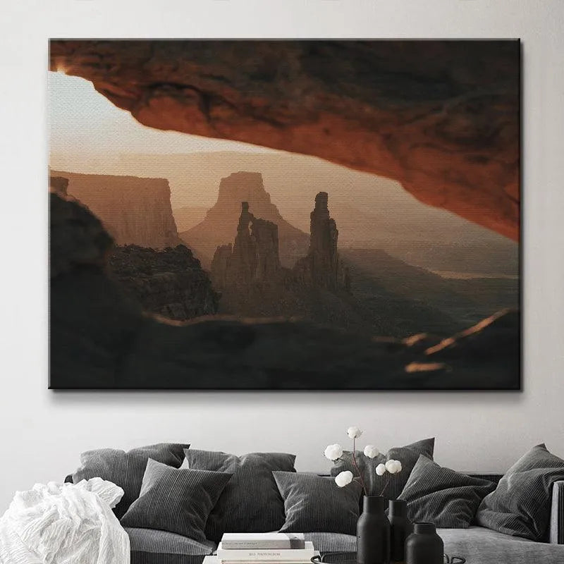 Lifestyle mock-up of the landscape print hanging in a modern living room, titled Under the Glow.