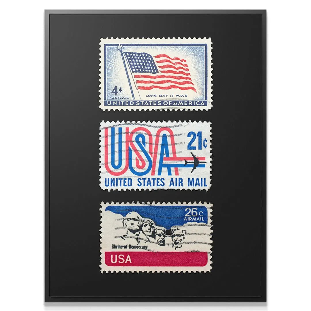 Full display of three iconic historic USA Postage Stamps on a high-contrast black background.