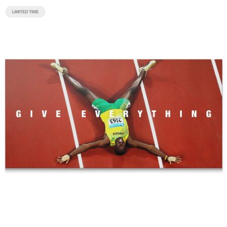Wide shot of Usain Bolt - Give Everything canvas showing the full sprinter celebration on the red running track.