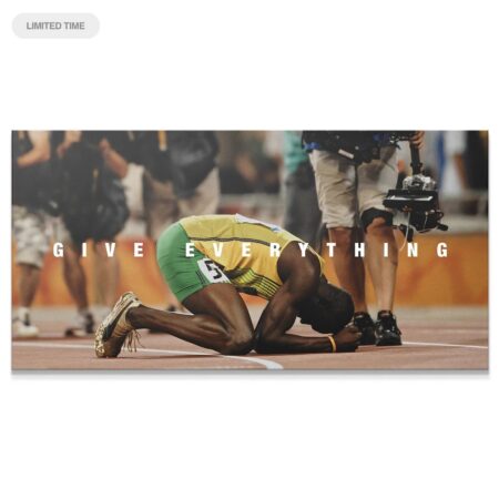 Full horizontal view of Usain Bolt kneeling on the track, featuring the text "Give Everything" in the 'Usain Bolt - Give Everything' poster.